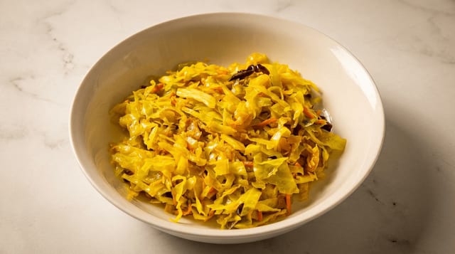 Tikil Gomen / Cabbage and Carrots.